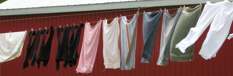 Laundry drying at a property adjacent to the trail